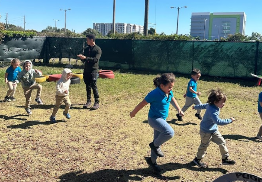 Coach Stephan with kids